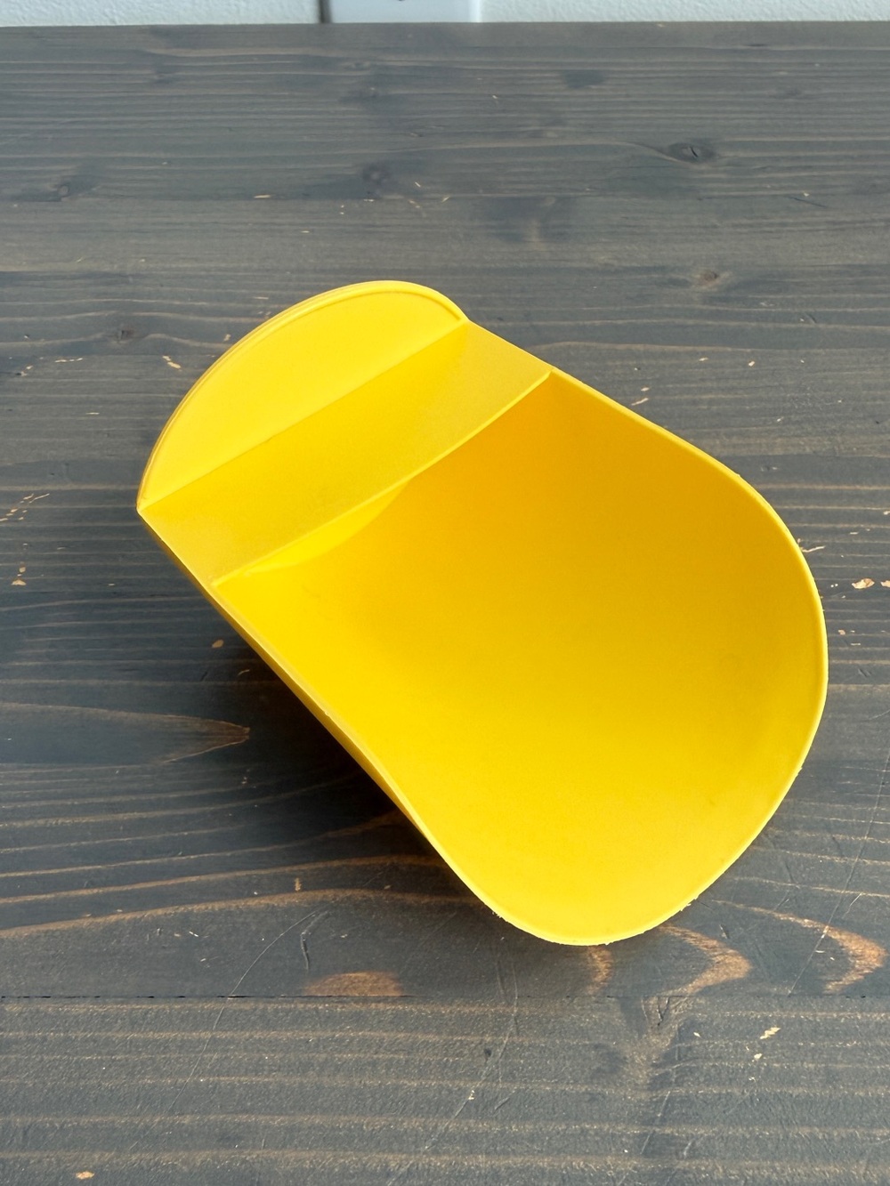 Vintage yellow Tupperware rocker scoop